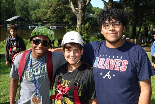 Jordan (left) is a camper-turned-counselor at Camp Wannaklot.